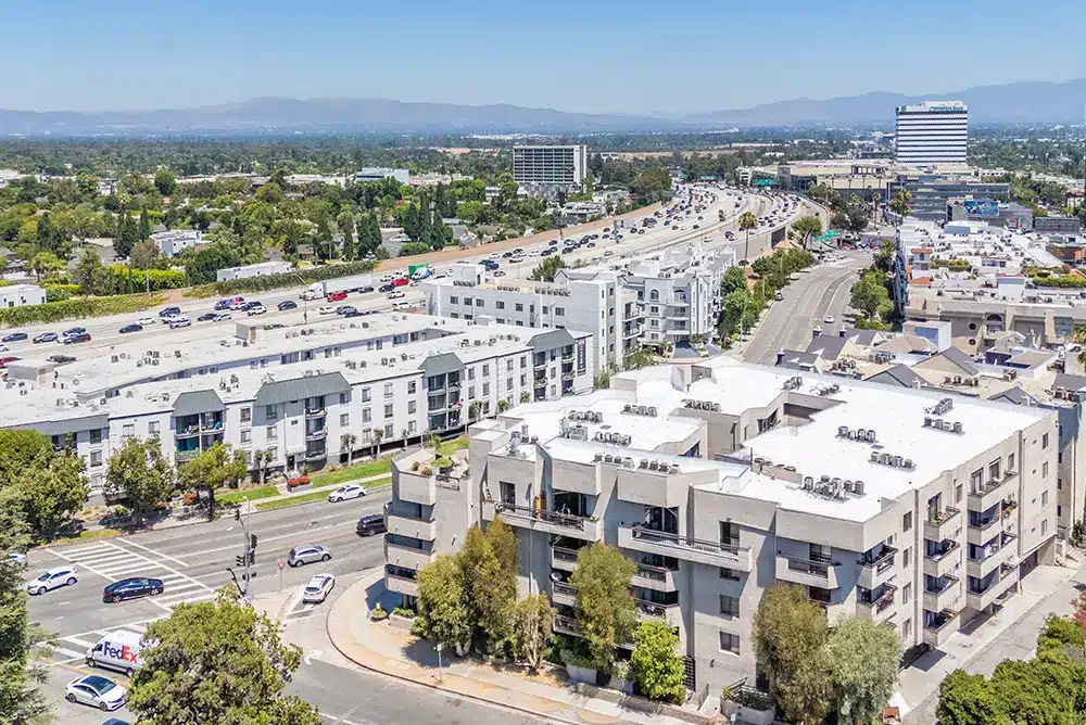 downward view of commercial building rooftops