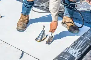 roofer fixing a commercial roof