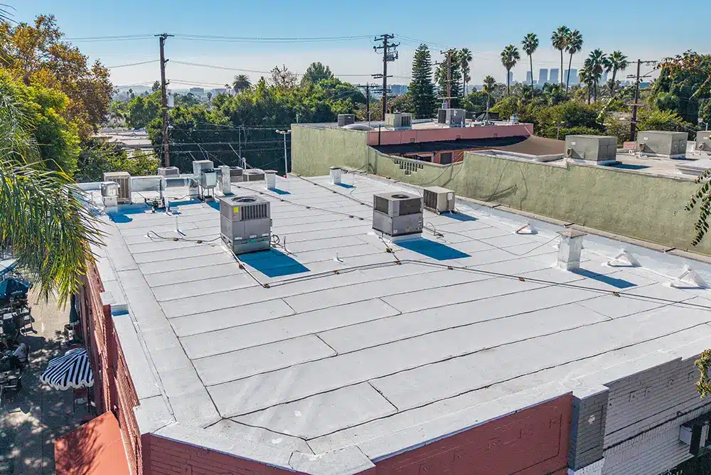 photograph of a new commercial roof on existing building